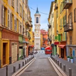 Town of Nice colorful street architecture and church view