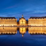 Place la Bourse in Bordeaux, the water mirror by night, France